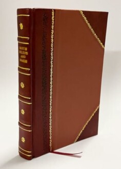 Vintage leather-bound book with ornate spine and cover design.